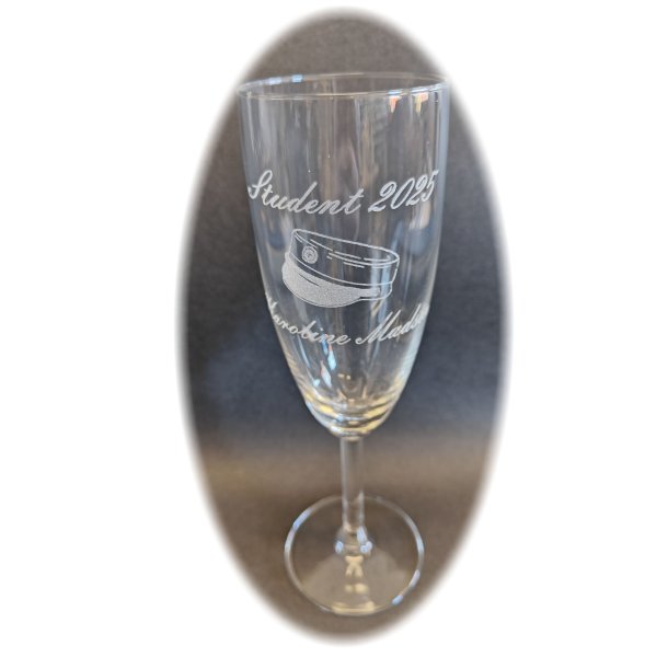 Champagne glas med studenter hue