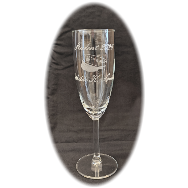 Champagne glas med studenter hue
